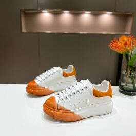 Alexander Mcqueen Oversized Sneakers Unisex Calf Leather with Melange Spray White/Orange