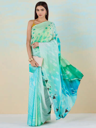 Shop Sky Blue Liva Crepe Floral Print Saree Online