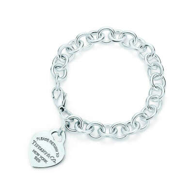 Tiffany & Co. -  Return to Tiffany® heart tag charm bracelet in sterling silver.