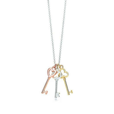 Tiffany & Co. - Tiffany Keys mini three-key pendant in silver and 18k rose and yellow gold.