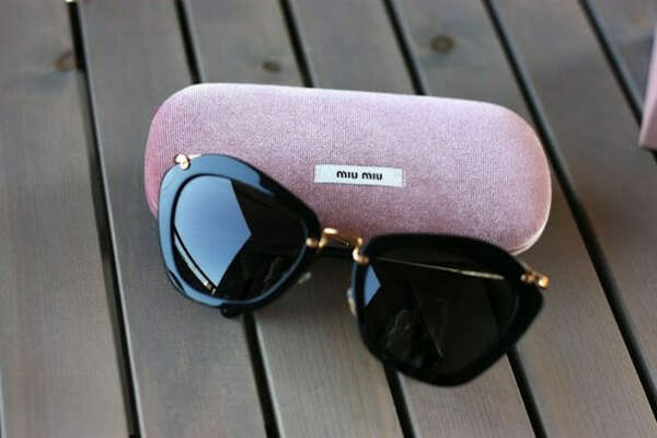 Sunglasses by Miu Miu